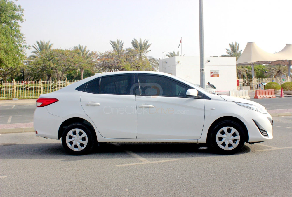 White Toyota Yaris Sedan 2019 for rent in Abu Dhabi 2